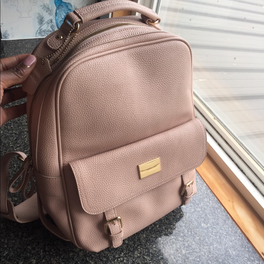 Pink faux leather backpack